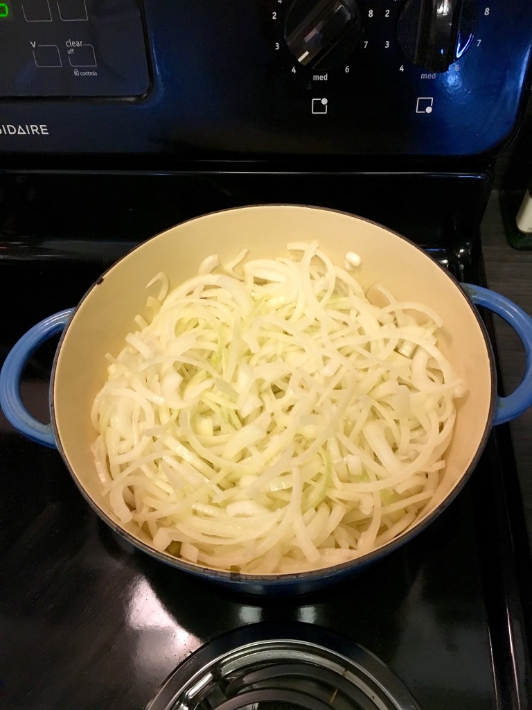 Step 1 - Slice onions and begin to sweat them down