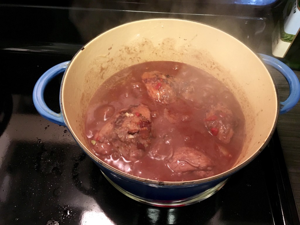 Add wine and stock and simmer.  Add the mushrooms half way through the simmer.